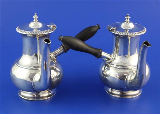 A pair of George V silver cafe au lait pots by William Hutton & Sons Ltd, gross 20 oz.